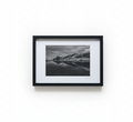 B&W coastal rock frame on white