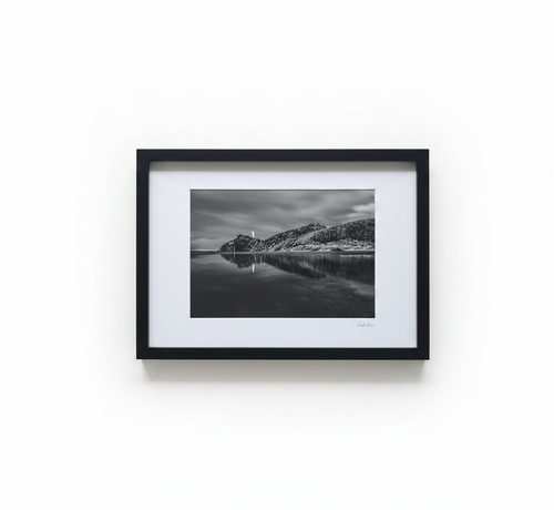 B&W coastal rock frame on white