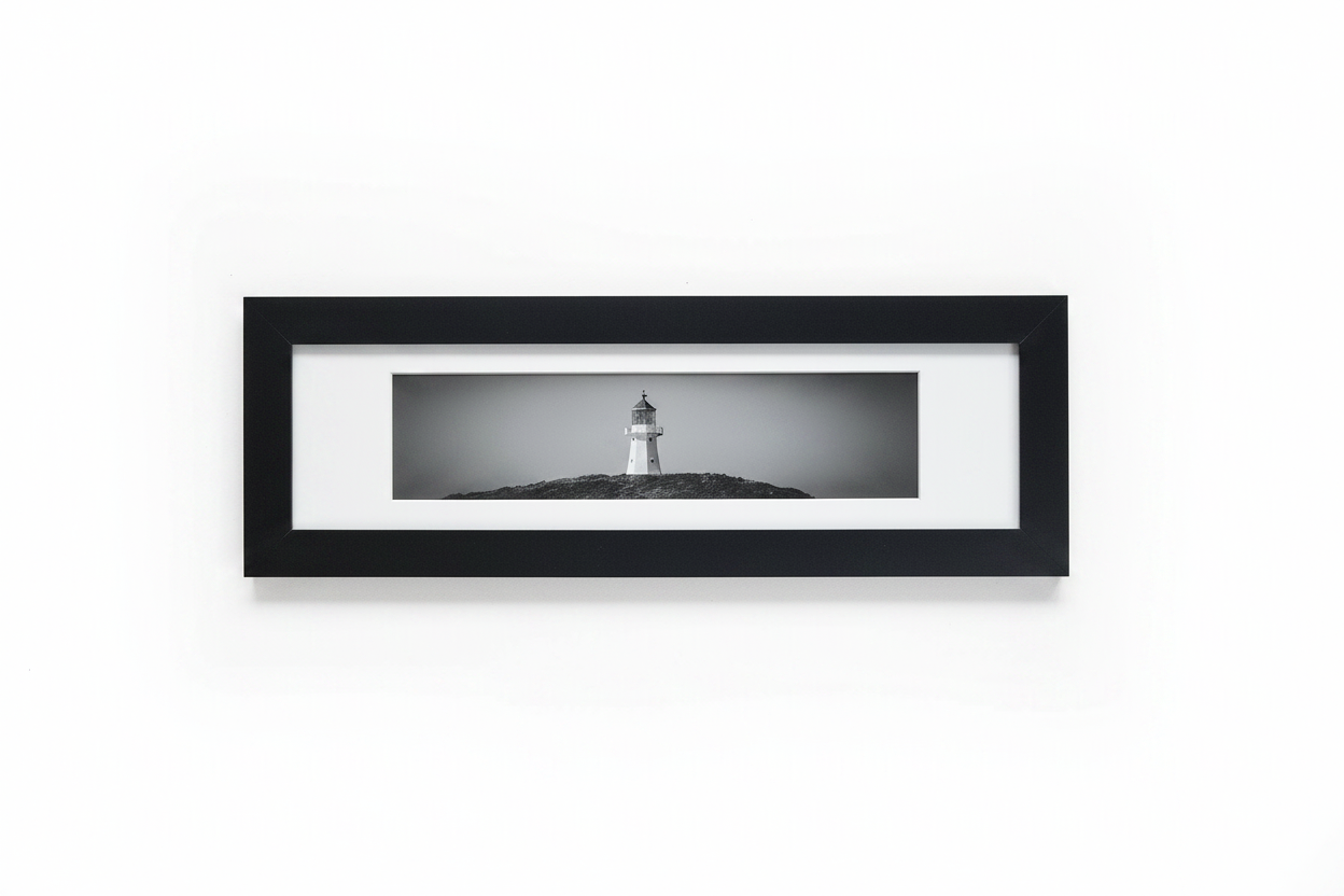 B&W lighthouse panoramic frame on white