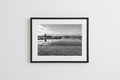 Lake scene in black frame with white matte
