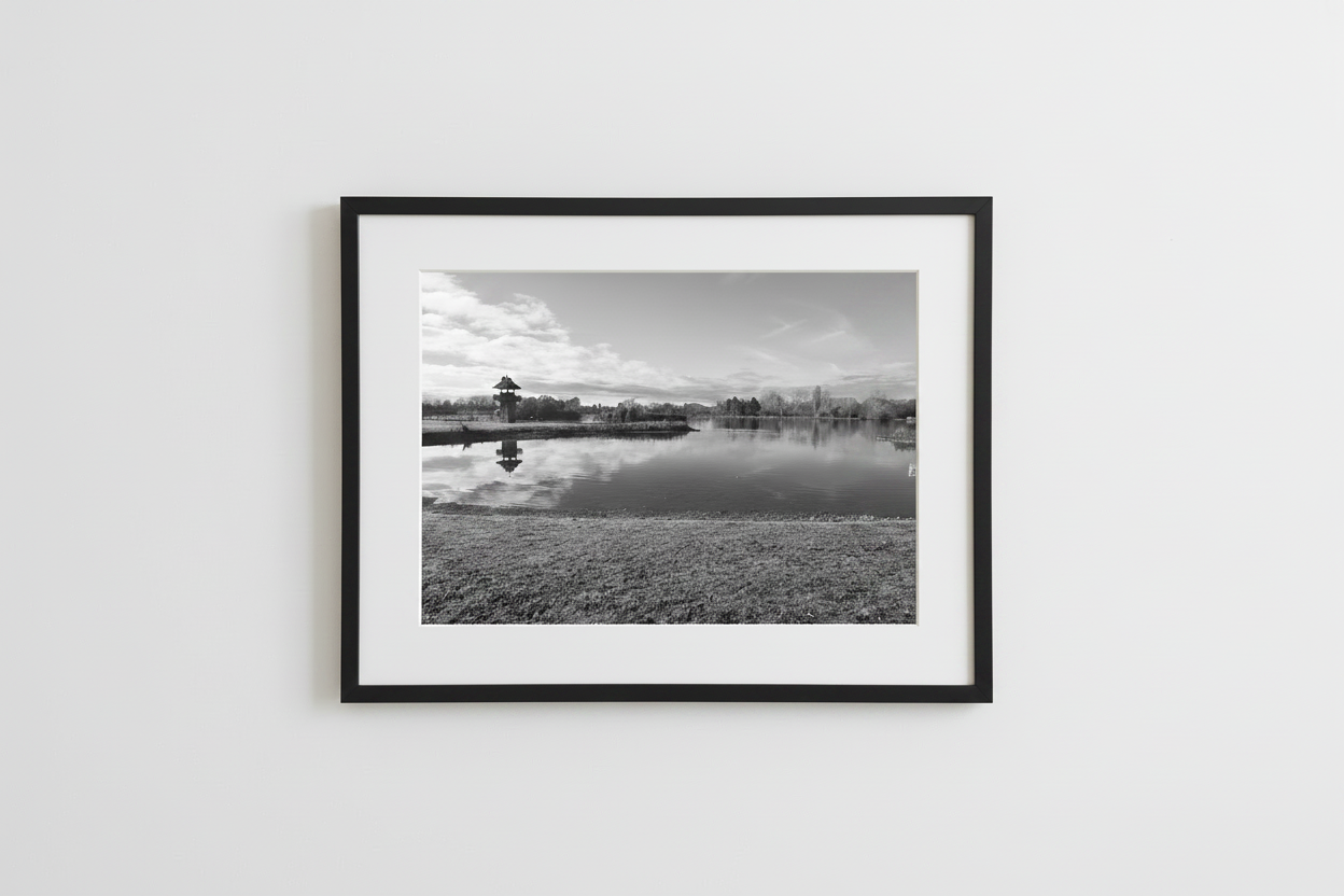 Lake scene in black frame with white matte