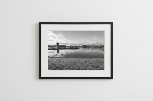Lake scene in black frame with white matte